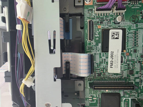 Unplugged cables inside Canon C256if