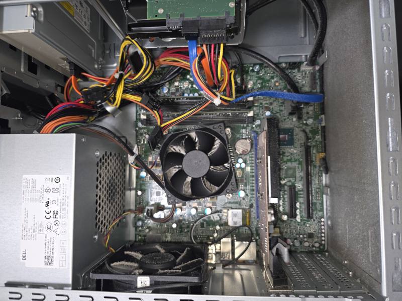 Dust buildup inside desktop computer causing overheating and poor airflow