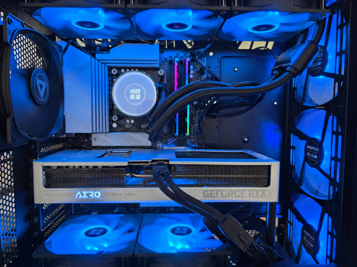Custom white RTX 5070 Ti gaming PC with Intel Core Ultra 7 and liquid cooling