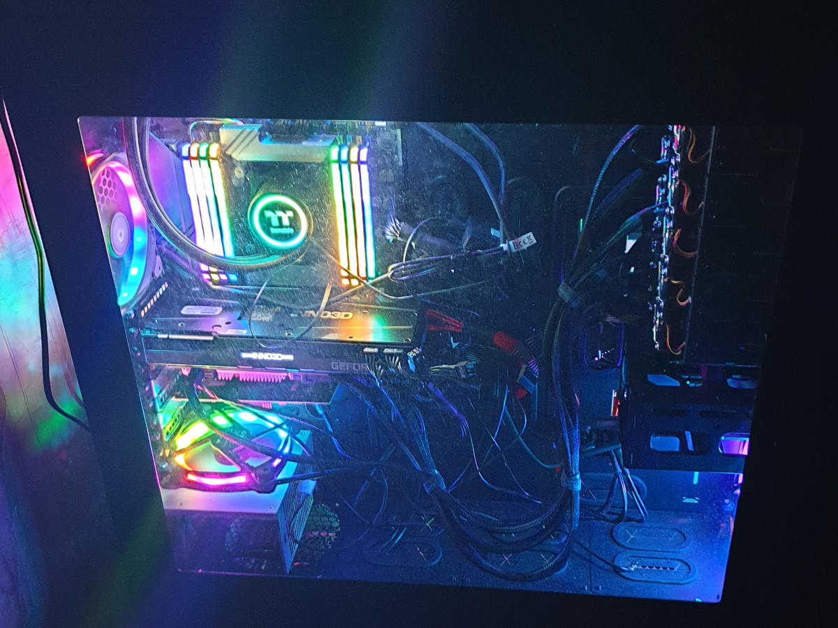 Large custom multi-GPU workstation with extensive storage and liquid cooling