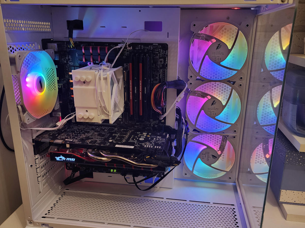 Older gaming PC rebuilt in a modern white case with improved cooling and airflow