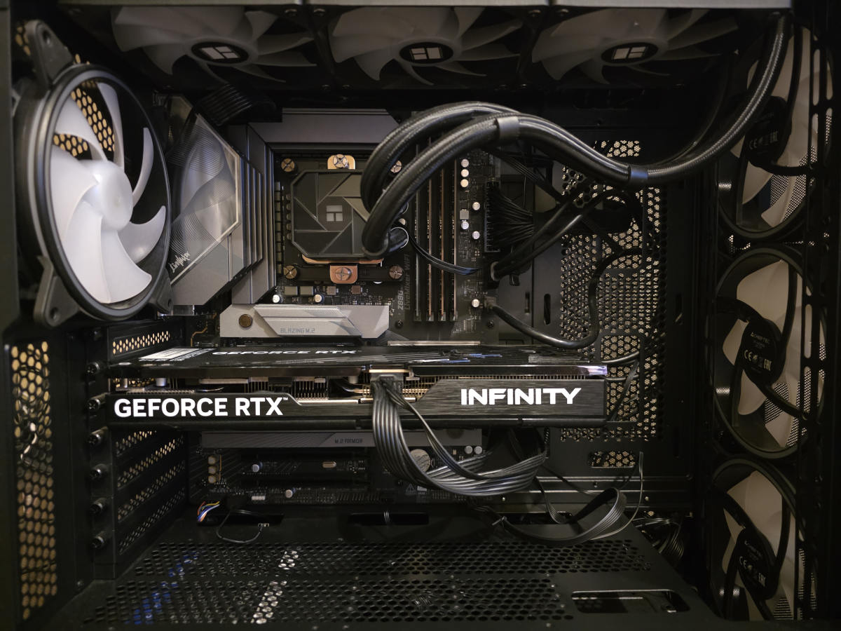 Black no-RGB custom gaming PC with GeForce RTX graphics and liquid cooling