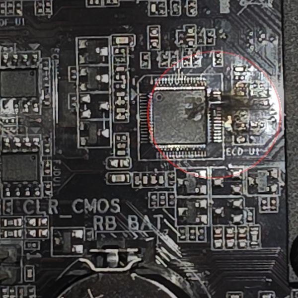 Burned motherboard component caused by failing computer power supply